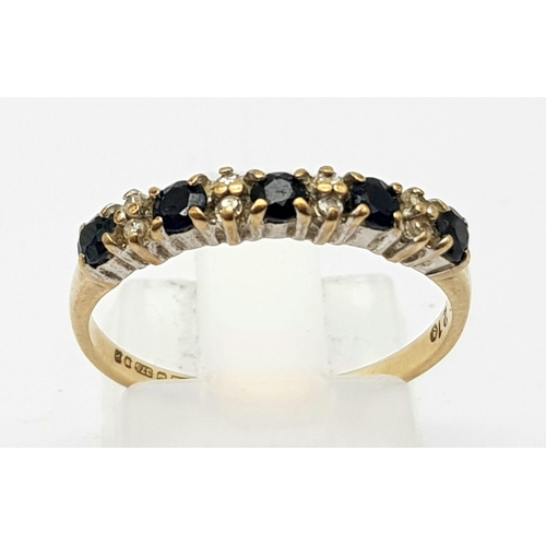 713 - 9K YELLOW GOLD DIAMOND & SAPPHIRE HALF ETERNITY RING. WEIGHS 1.4G. SIZE N