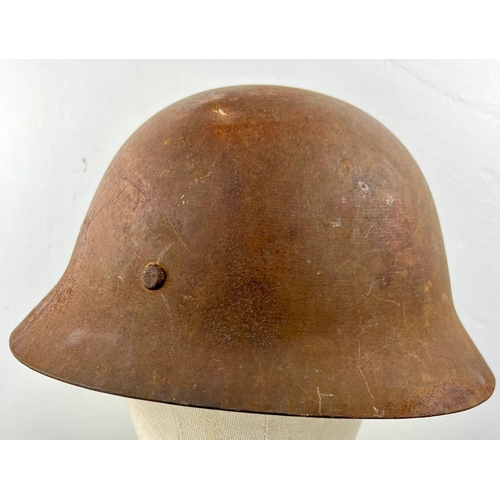 75 - WWII JAPANESE ARMY HELMET WITH ORIGINAL PAINT AND GREAT PATINA WITH REMNANTS OF ORIGINAL LINER.