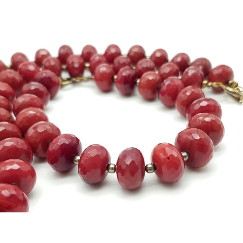 911 - RED STONE FACETED NECKLACE. WEIGHS 103.5G