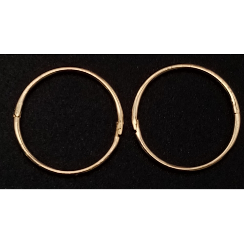 934 - 9K YELLOW GOLD SLEEPER HOOP EARRINGS. WEIGHS 0.9G