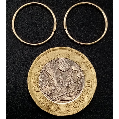 934 - 9K YELLOW GOLD SLEEPER HOOP EARRINGS. WEIGHS 0.9G