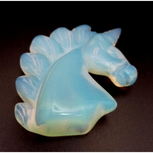 964 - An Opalite Unicorn's Head Figurine. 6cm.