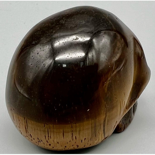 971 - A Tigers Eye Skull Figure. 6cm.