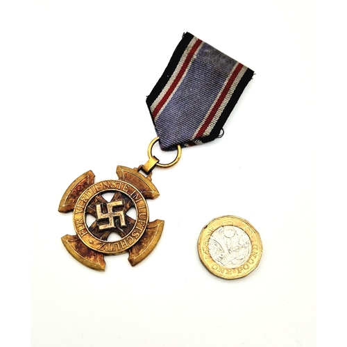 498 - WW2 German 1st Class Luftschutz Medal – A hard to find award.