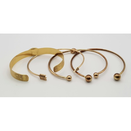 1041 - NILAI PARIS DESIGNER CALYPSO 24K GOLD VERMEIL STONE SET BANGLE 11.2G PLUS 3 OTHER GOLD TONE BANGLES ... 