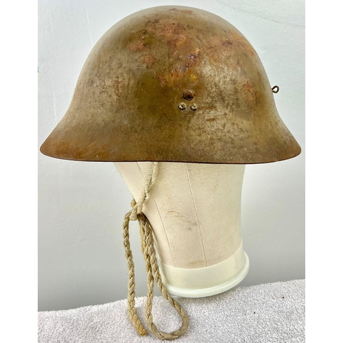 244 - WWII JAPANESE HELMET , ORIGINAL TEA-GREEN PAINT AND PARTIAL HEMP LINER . NAME OF SATO INSIDE.