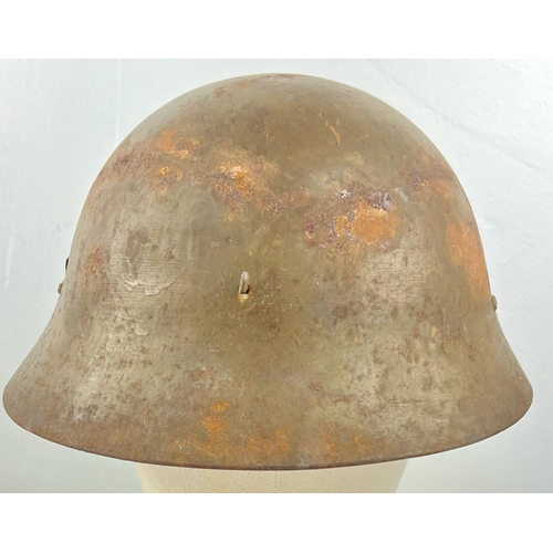 244 - WWII JAPANESE HELMET , ORIGINAL TEA-GREEN PAINT AND PARTIAL HEMP LINER . NAME OF SATO INSIDE.