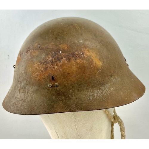 244 - WWII JAPANESE HELMET , ORIGINAL TEA-GREEN PAINT AND PARTIAL HEMP LINER . NAME OF SATO INSIDE.