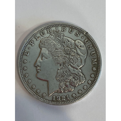 308 - SILVER U.S. SILVER MORGAN DOLLAR 1921. Small blemish to edge otherwise very fine condition. Bold rai... 