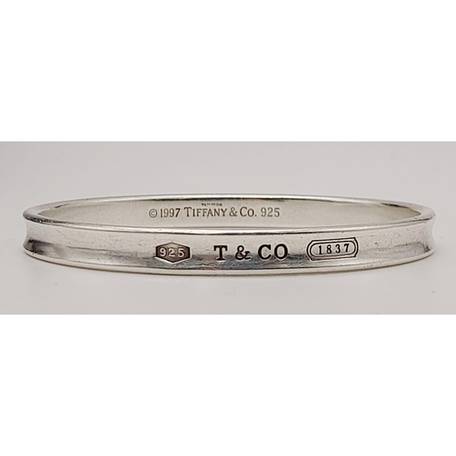 348 - TIFFANY & CO STERLING SILVER BANGLE 32.3G