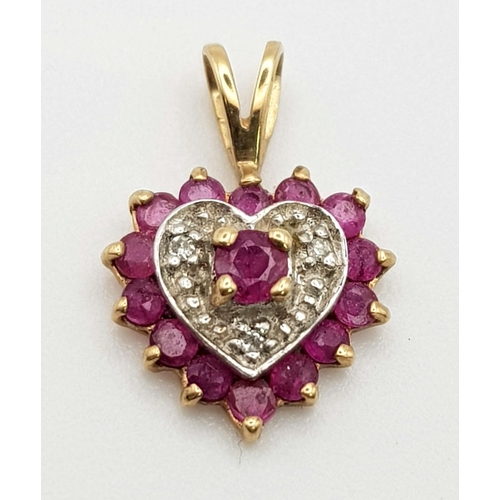 585 - 9K YELLOW GOLD DIAMOND & RUBY HEART PENDANT. WEIGHS 0.7G