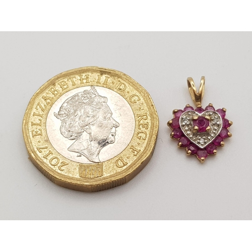 585 - 9K YELLOW GOLD DIAMOND & RUBY HEART PENDANT. WEIGHS 0.7G