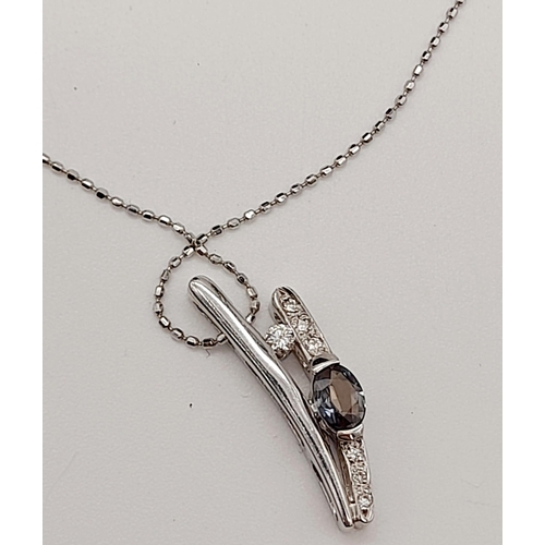 788 - 18K WHITE GOLD DIAMOND & SAPPHIRE PENDANT ON 40CM  CHAIN. TOTAL WEIGHT  3G