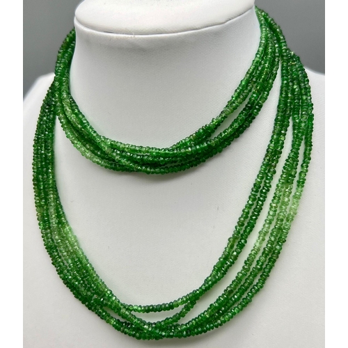 864 - GREEN GARNET FACETTED NECKLACE 5 ROW NECKLACE. TOTAL WEIGHT 40.4G