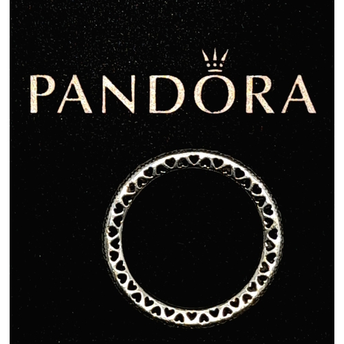 962 - PANDORA STERLING SILVER SPARKLE & HEARTS RING. COMES WITH BOX. WEIGHS 1.8G. SIZE K