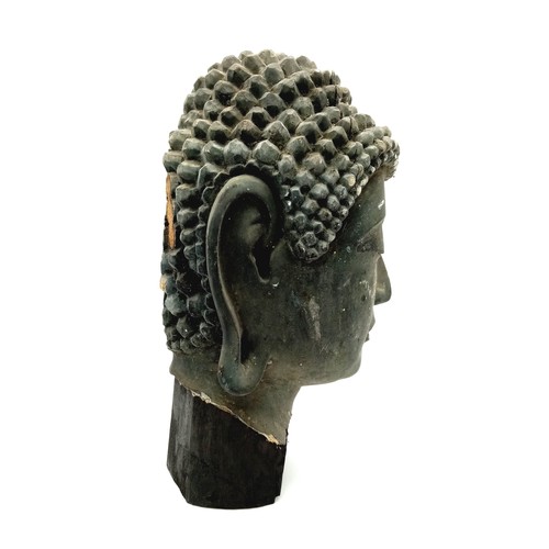 595 - AN EXTREMELY OLD ANTIQUE GEM SET HAND CARVED WOODEN BUDDHIST HEAD WITH FLAT BACK  25 X 13cms. a/f