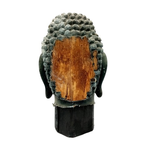 595 - AN EXTREMELY OLD ANTIQUE GEM SET HAND CARVED WOODEN BUDDHIST HEAD WITH FLAT BACK  25 X 13cms. a/f