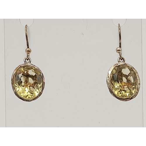 1341 - New Sterling Silver 12mm long Oval Cut Citrine Earrings. In Presentation Box.