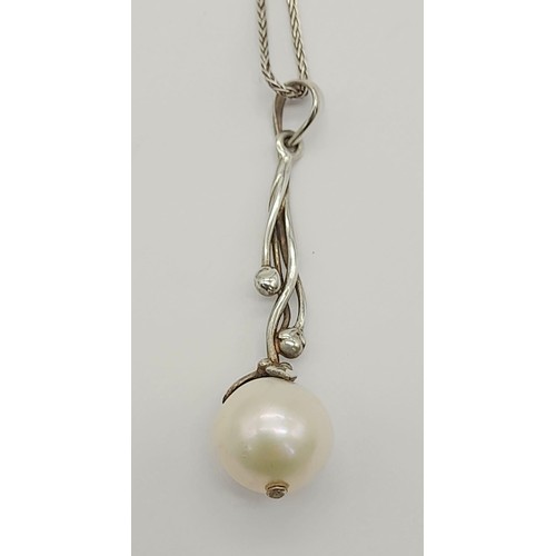 1361 - New Sterling Silver Pearl Drop Pendant. 11mm Pearl 38cm Length Chain,
4cm Drop Pendant.4.91 grams. I... 