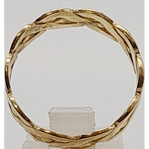 683 - 9K YELLOW GOLD CELTIC BAND RING. WEIGHS 2.5G.  SIZE R