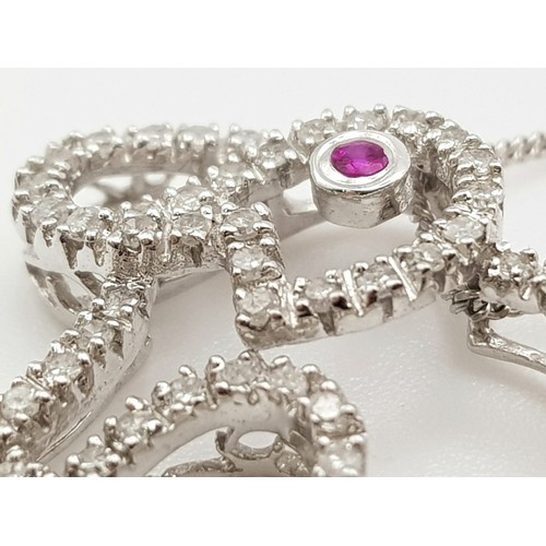 417 - 9K WHITE GOLD DIAMOND & RUBY SET, ELEPHANT PENDANT, ON A 42CM LENGTH CHAIN. TOTAL WEIGHT. 2.5G