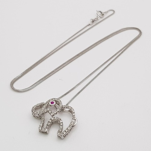 417 - 9K WHITE GOLD DIAMOND & RUBY SET, ELEPHANT PENDANT, ON A 42CM LENGTH CHAIN. TOTAL WEIGHT. 2.5G