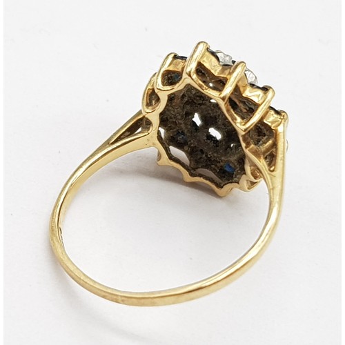 699 - 9K YELLOW GOLD DIAMOND & SAPPHIRE CLUSTER RING. WEIGHS 2G.  SIZE K/L