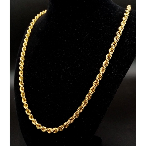 147 - A 9K yellow gold, long, rope chain necklace, presented in a velvet pouch. Length: 80 cm, weight: 21g... 