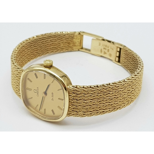 16 - A Solid 9k Gold Omega De Ville Ladies Watch. 9k gold bracelet and case - 22mm. Gold tone dial. Quart... 