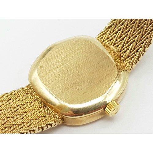 16 - A Solid 9k Gold Omega De Ville Ladies Watch. 9k gold bracelet and case - 22mm. Gold tone dial. Quart... 