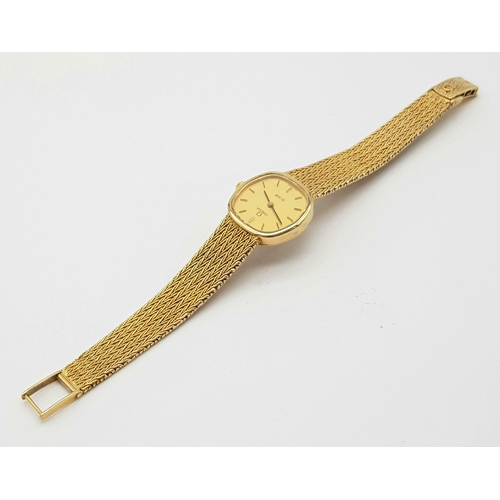 16 - A Solid 9k Gold Omega De Ville Ladies Watch. 9k gold bracelet and case - 22mm. Gold tone dial. Quart... 