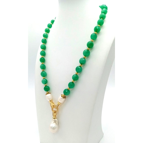 160 - A multi-faceted green jade necklace and earrings set, adorned with large, natural, white, baroque pe... 