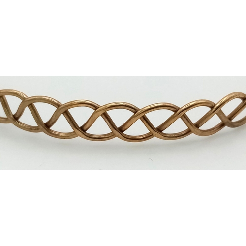 34 - A Vintage 9K Yellow Gold Lattice Bangle. 6.5cm inner diameter. 7.04g