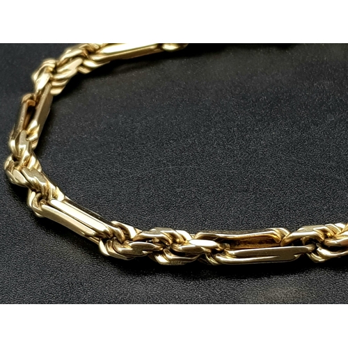 23 - A Gorgeous Italian 14K Yellow Gold Figaro Link Bracelet. 21cm. 22.39g