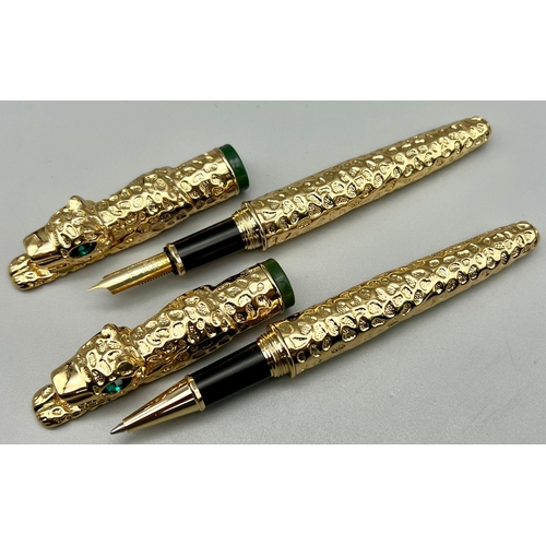 133 - A designer style, heavy, panther shaped, pair of gold filled pens in presentation boxes. One is a fo... 