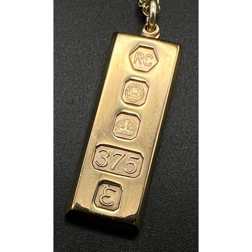 3 - A 9K Yellow Gold Ingot Pendant on a 9K Yellow Gold Chain. 5cm and 50cm. Hallmarks for Sheffield 1979... 