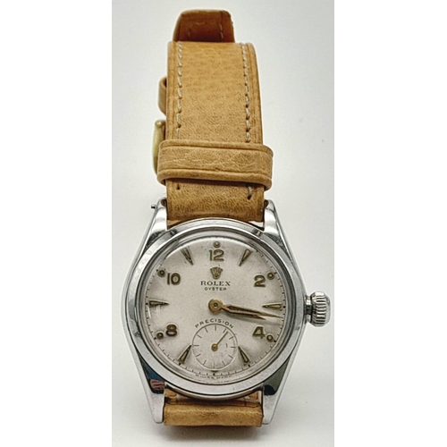 17 - A Vintage Rolex Oyster Precision Watch. Leather strap. Stainless steel case - 30mm. White dial with ... 