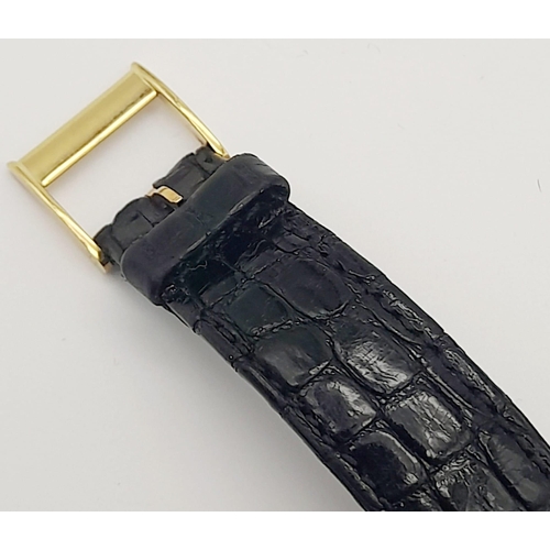 24 - A Sublime Dunhill 18K Gold Limited Edition 100th Anniversary Unisex Watch. Original Black leather st... 