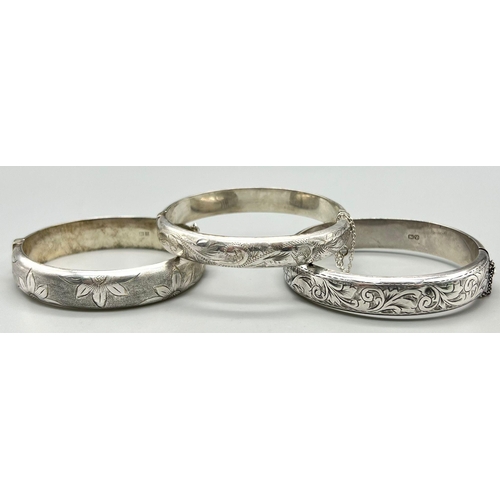 674 - Three 925 Silver Vintage Bangles. 55g total weight.