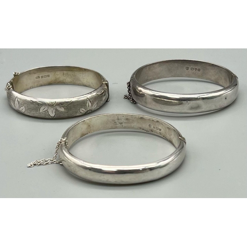 674 - Three 925 Silver Vintage Bangles. 55g total weight.