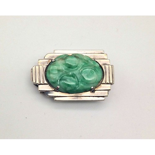 979 - An Antique Art Deco Hand-Carved Oval Jade Clip-On Piece set in 9K White Gold. 7.5g total weight. 3cm... 