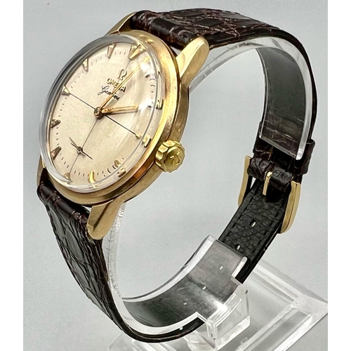 152 - A Vintage Omega Geneve 9K Gold Gents Watch. Leather strap. Gold case - 34mm. Cream dial with sub sec... 