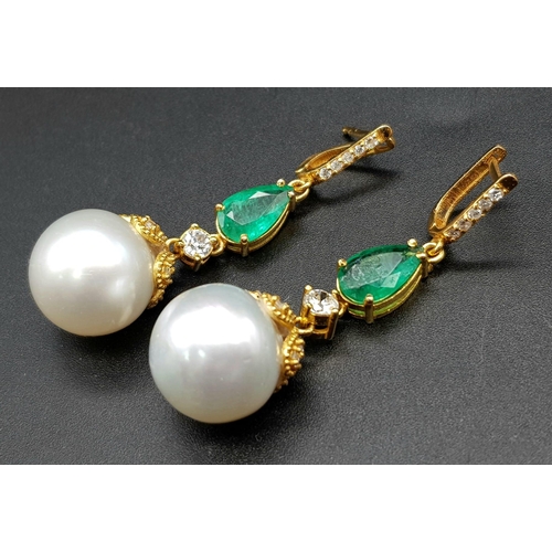 118 - A Pair of High Karat Gold, Large South Sea Pearl, Emerald and Diamond Earring and Pendant Set. 4cm d... 