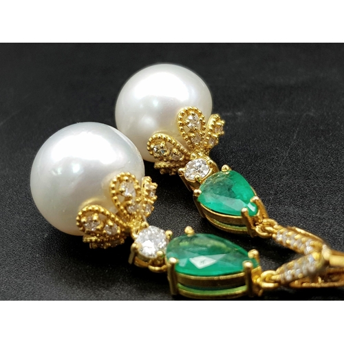 118 - A Pair of High Karat Gold, Large South Sea Pearl, Emerald and Diamond Earring and Pendant Set. 4cm d... 