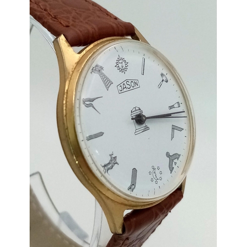 1555 - A Jason Masonic Gents Watch. Brown leather strap. Two tone steel case - 34mm. White dial with Masoni... 