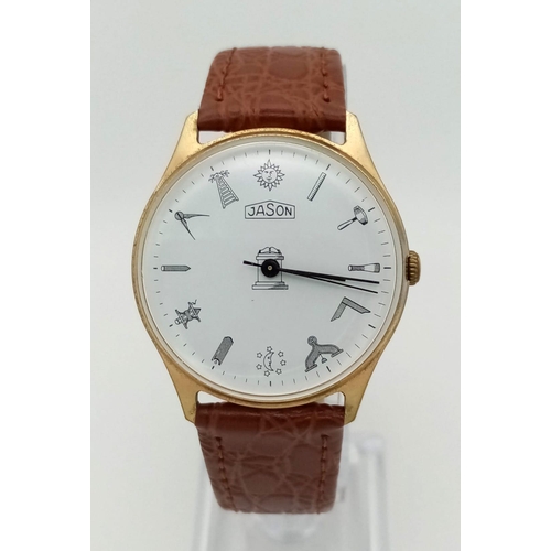 1555 - A Jason Masonic Gents Watch. Brown leather strap. Two tone steel case - 34mm. White dial with Masoni... 