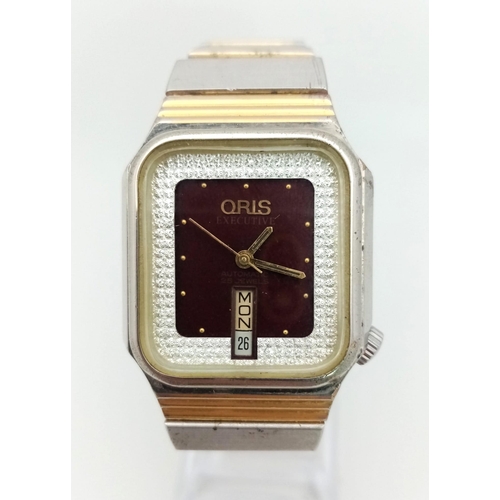 234 - A Vintage Oris Automatic Gents Watch. Two tone stainless steel strap. Case - 32mm. Burgundy and whit... 