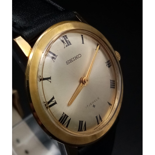 89 - A Lovely Vintage Seiko Gents Mechanical Dress Watch. Black leather strap. Gold plated case - 33mm. 1... 