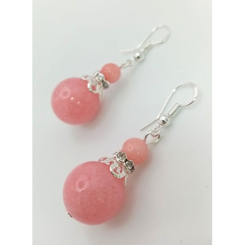 1546 - A Pair of Pink Jade Graduated Ball Drop Earrings. 3cm drop. Largest ball - 14mm.