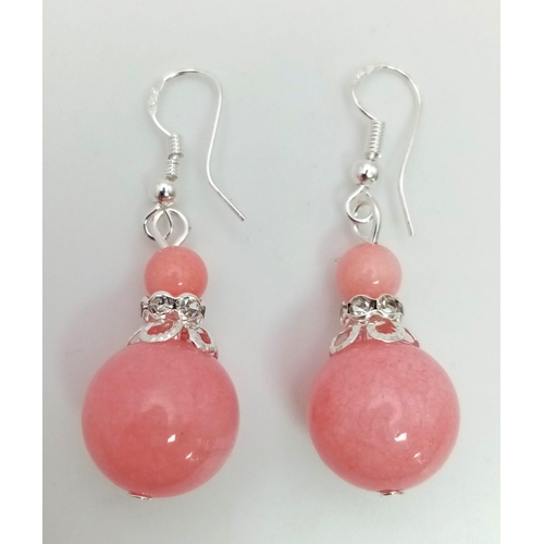 1546 - A Pair of Pink Jade Graduated Ball Drop Earrings. 3cm drop. Largest ball - 14mm.